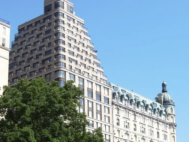 Apartment tower and a beaux-arts apartment building seen from Central Park