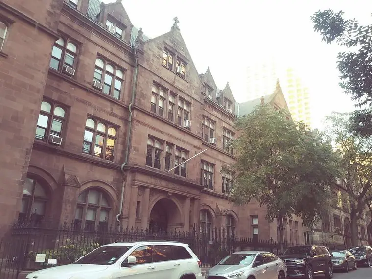 Independent school building with brownstone-colored stone facade on West 91st Street
