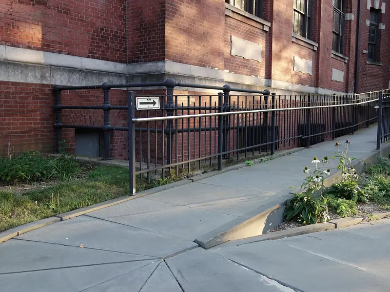 Brooklyn library entrance with a ramp and handrails